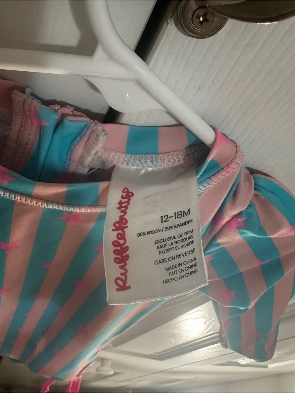 Ruffle Butts Teal & Pink Striped Star Long Sleeve Swimsuit with Ruffles